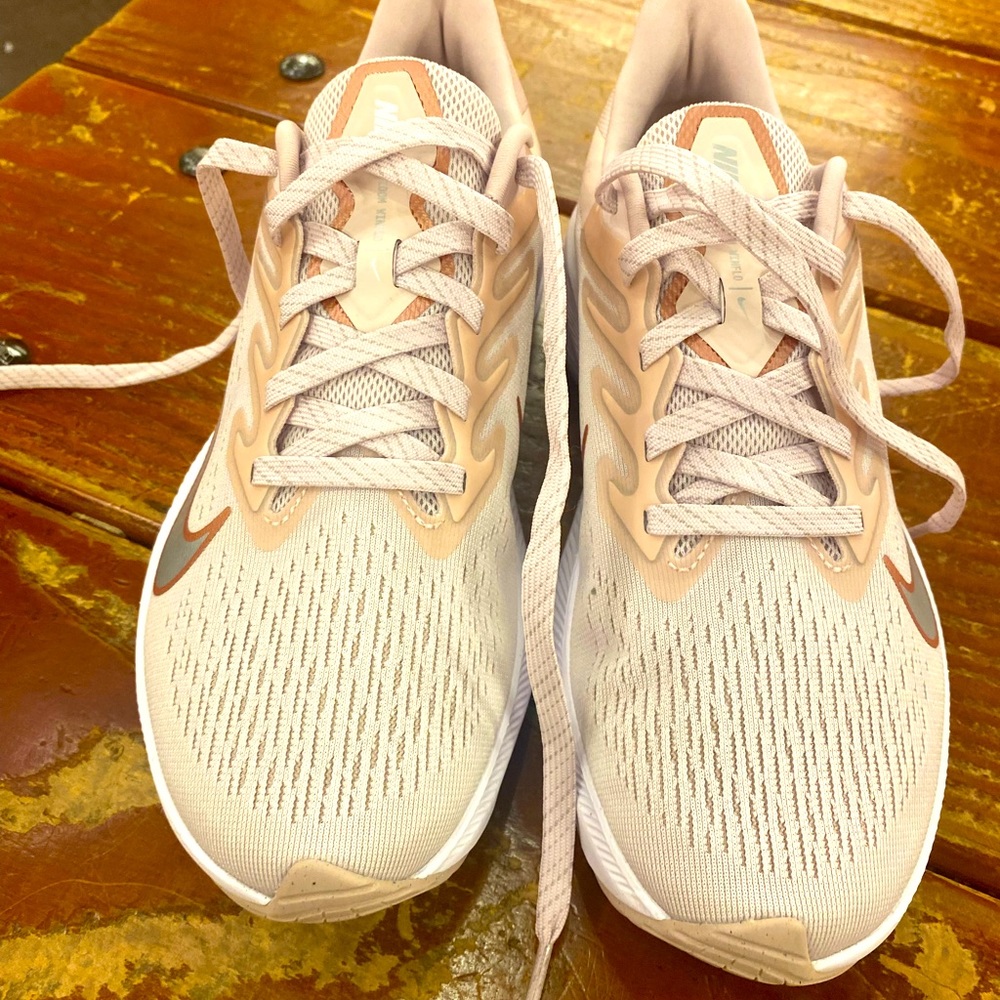 Worn once.  Nike Zoom winflo 7 . Peach color . In perfect condition.